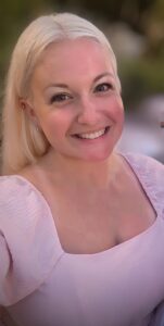 A photograph of Melissa Repoza, Senior Grant Specialist for the Pre-Award Team